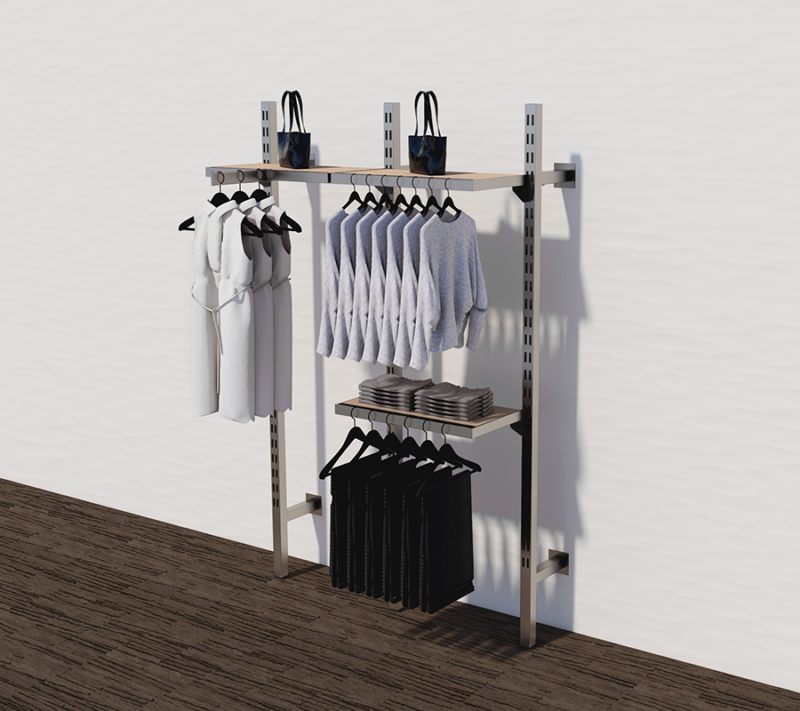 example set of our satin nickel finish slotted system fixtures with clothes hanging from the hangrail and wooden shelves to display neatly folded clothes and handbags.
