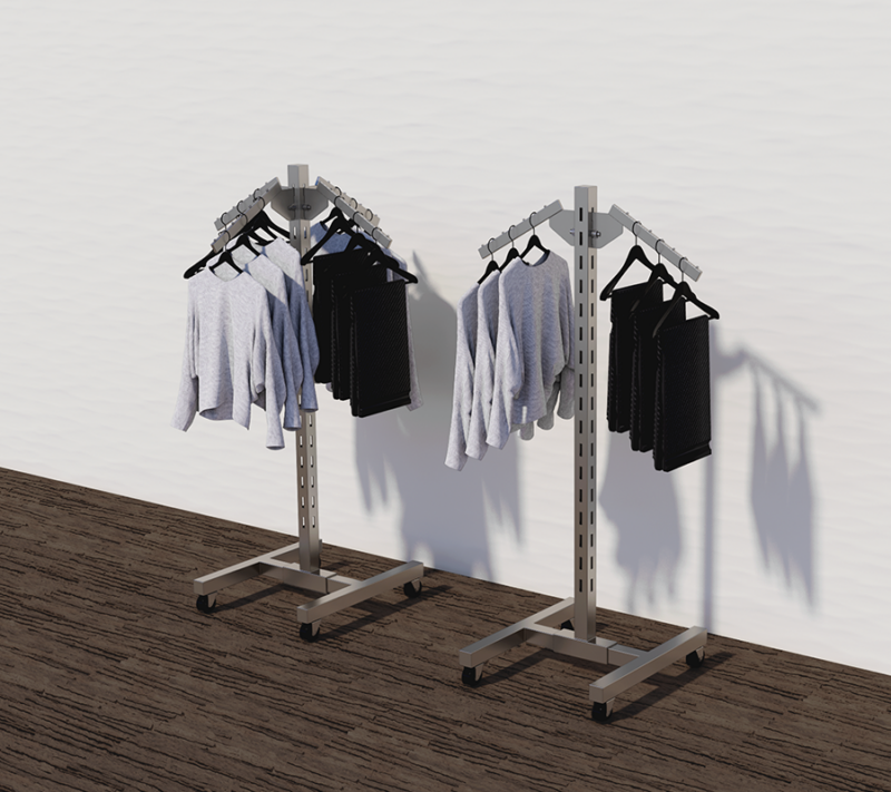 example set of our satin nickel finish single slotted displayer with clothes hanging from the hangrail.