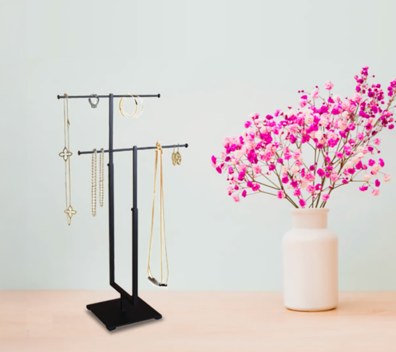 Matte Black 2-Tier Jewelry Display, elegantly displaying various accessories in an aesthetic setting