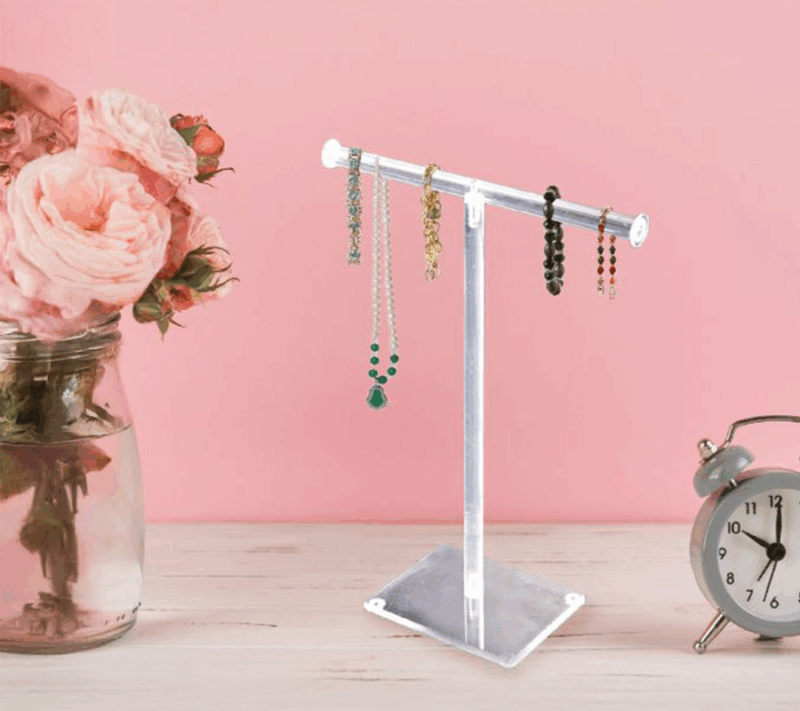 Acrylic Single-Tier Necklace And Bracelet Bar Display,elegantly displaying various accessories in an aesthetic setting