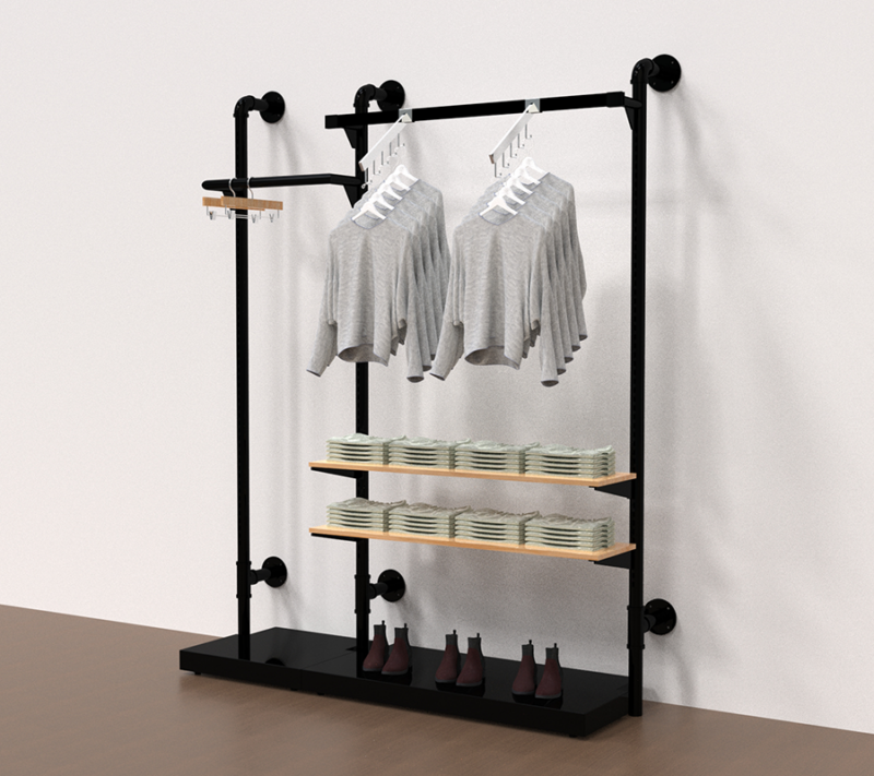 example set of our matte black pipline retail system with clothes hanging from the hangrail and wooden shelves to display clothes and Handbags and bases to display shoes.