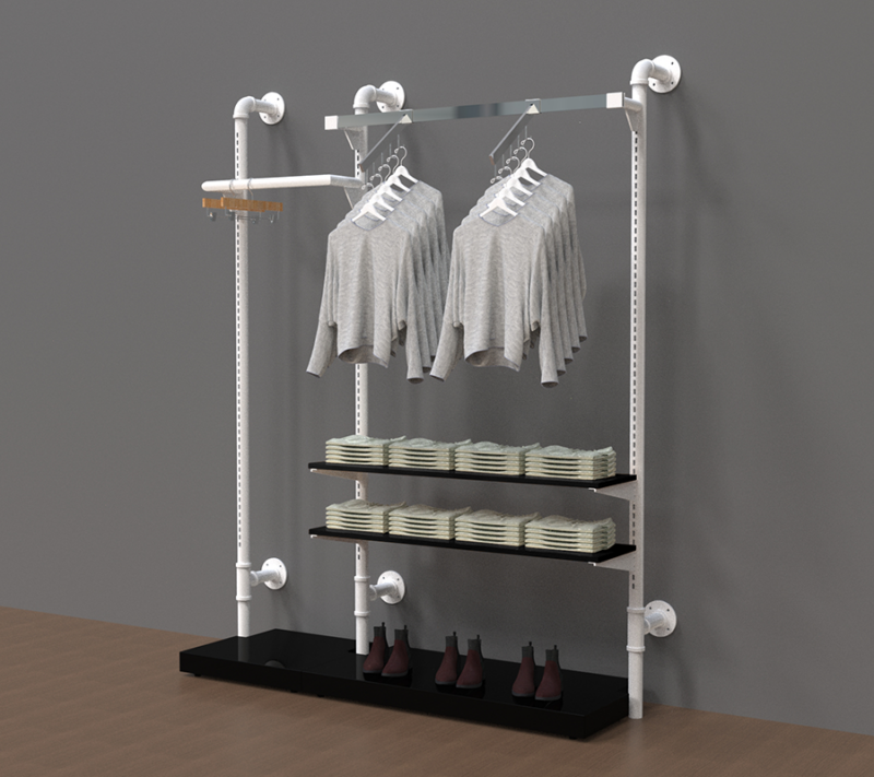 example set of our matte white pipline retail system with clothes hanging from the hangrail and wooden shelves to display clothes and Handbags and bases to display shoes.