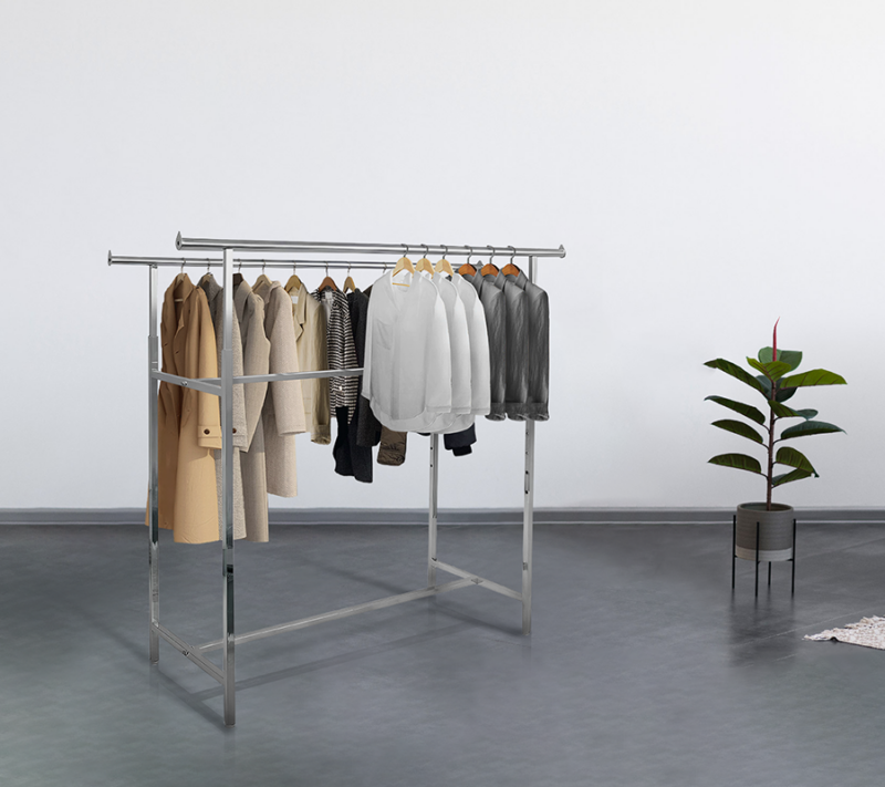 60" standard commercial grade steel apparel H-rack with various clothes in an aesthetic setting